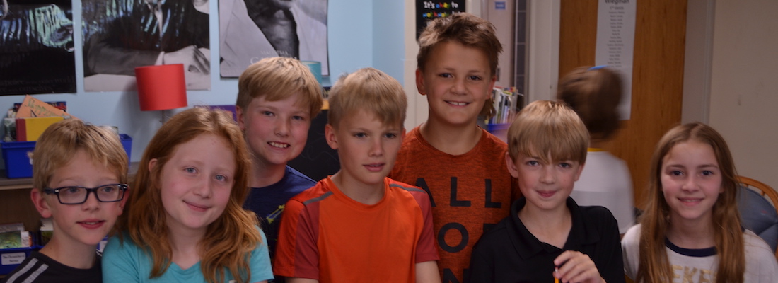 Group of students posing in class