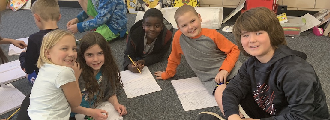 Group of students posing in class